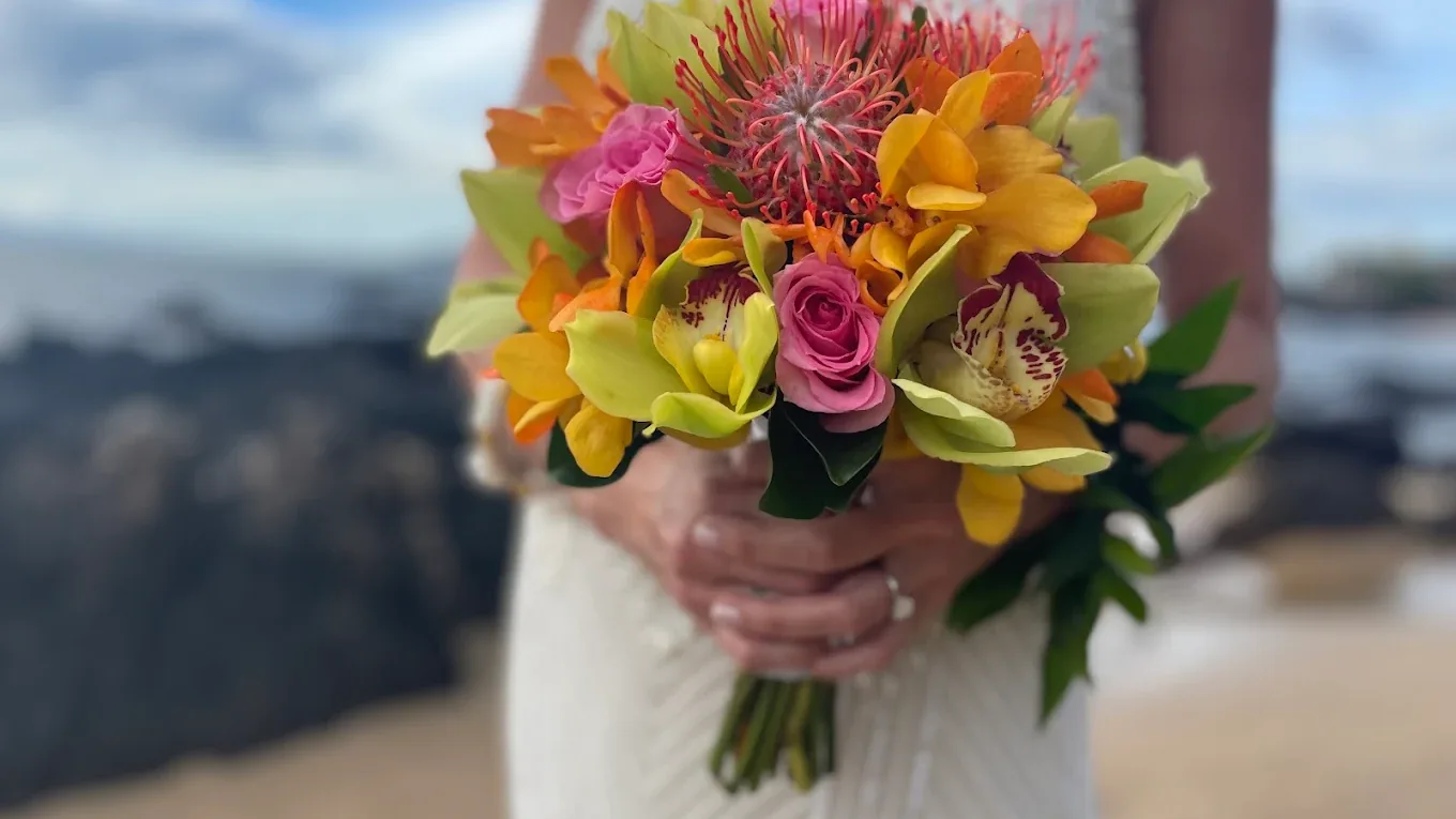 A bright, hand-tied tropical bouquet by Kihei-Wailea Flowers By Cora