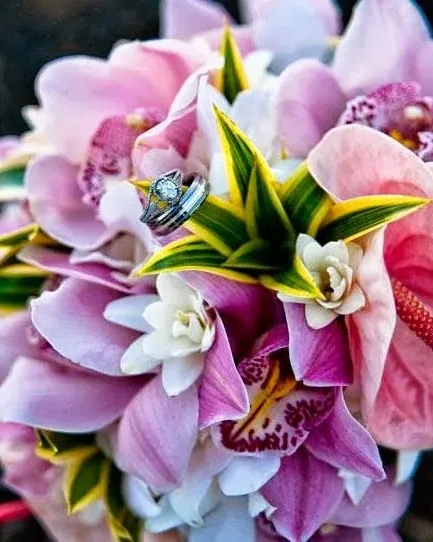 A close-up of a pink lily arrangement